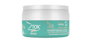Jar of ZTOX hair mask with green label on a white background